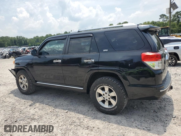 2013 Toyota 4Runner SR5 with VIN JTEZU5JR4D5052340, listed as a Copart auction lot 61809055 with 143,134 mi miles and Salvage title. Bid and sale history available at DreamBid. Image 2.