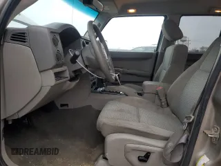 2006 Jeep Commander z VIN 1J8HG48N66C182857, wystawiony jako Copart lot #80734914 z przebiegiem 138 838 mil mil oraz Szkoda całkowita • Salvage title. Historia ofert i sprzedaży dostępna na DreamBid. Obrazek 7.