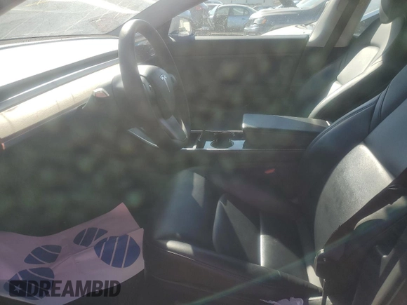2020 Tesla Model 3 Standard Range Plus with VIN 5YJ3E1EA2LF658205, listed as a Copart auction lot 42481975 with 55,303 mi miles and Salvage Title. Bid and sale history available at DreamBid. Image 7.