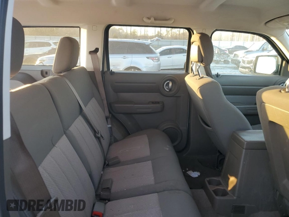 2010 Dodge Nitro SE z VIN 1D4PT2GK0AW104045, wystawiony jako Copart lot #46216635 z przebiegiem 170 533 mil mil oraz Szkody całkowita. Historia ofert i sprzedaży dostępna na DreamBid. Obrazek 10.