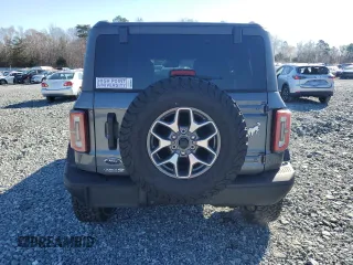 2023 Ford Bronco с VIN 1FMEE5DP6PLA81294, выставлен на аукционе Copart как лот 49076545 с пробегом 13 002 миль миль и На запчасти • Non repairable. История ставок и продаж доступна на DreamBid. Изображение 6.