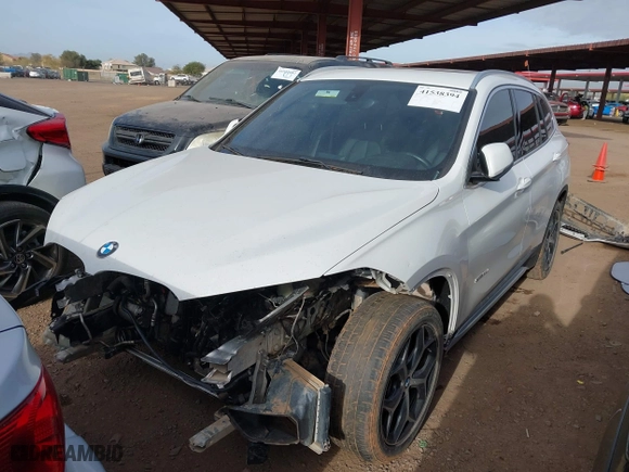 2018 BMW X1 sDrive28i with VIN WBXHU7C32J5H41587, listed as a IAAI auction lot 41538394 with 125,804 mi miles. Bid and sale history available at carsss.com. Image 18.