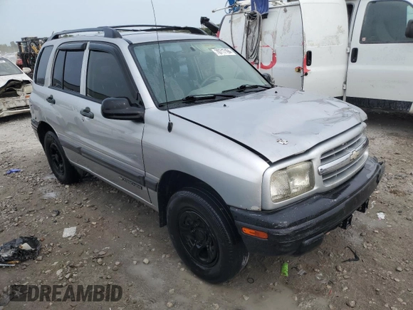 2002 Chevrolet Tracker with VIN 2CNBE13C926934704, listed as a Copart auction lot 70717194 with 189,076 mi miles and Salvage title. Bid and sale history available at DreamBid. Image 4.