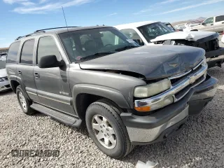 2002 Chevrolet Tahoe LT with VIN 1GNEK13Z62J247298, listed as a Copart auction lot 71092694 with 147,149 mi miles and Salvage Title. Bid and sale history available at carsss.com. Image 4.