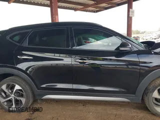 2017 Hyundai Tucson Value z VIN KM8J33A22HU316495, wystawiony jako IAAI lot #41896507 z przebiegiem 82 517 mil mil oraz . Historia ofert i sprzedaży dostępna na DreamBid. Obrazek 13.