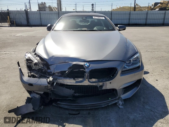 2015 BMW M6 z VIN WBS6C9C56FD467608, wystawiony jako Copart lot #67796074 z przebiegiem 67 706 mil mil oraz Szkoda całkowita • Salvage title. Historia ofert i sprzedaży dostępna na DreamBid. Obrazek 5.