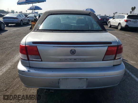 2000 Cadillac Catera z VIN W06VR54R1YR003905, wystawiony jako Copart lot #76417144 z przebiegiem 80 894 mil mil oraz Czysty tytuł • Clean title. Historia ofert i sprzedaży dostępna na DreamBid. Obrazek 6.