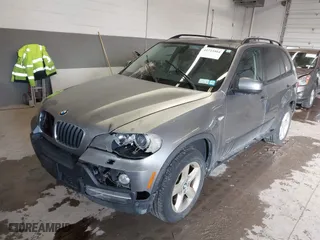 2009 BMW X5 30i with VIN 5UXFE43559L272922, listed as a IAAI auction lot 41723504 with 210,793 mi miles. Bid and sale history available at carsss.com. Image 17.