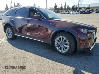 2024 Mazda CX-90 Premium z VIN JM3KKDHD8R1113467, wystawiony jako Copart lot #50405355 z przebiegiem 10 267 mil mil oraz Szkody całkowita. Historia ofert i sprzedaży dostępna na DreamBid. Obrazek 4.