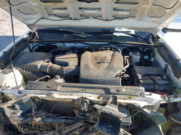 2018 Toyota Tacoma SR5 with VIN 3TMAZ5CN4JM062272, listed as a IAAI auction lot 41671472 with 114,566 mi miles and . Bid and sale history available at DreamBid. Image 10.