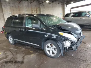 2014 Toyota Sienna LE AAS with VIN 5TDKK3DC7ES426751, listed as a IAAI auction lot 41975870 with 100,000 mi miles. Bid and sale history available at carsss.com. Image 1.