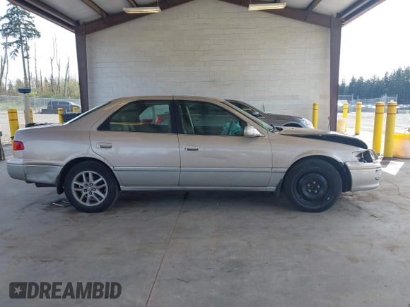 2001 Toyota Camry LE z VIN JT2BF28K110320365, wystawiony jako IAAI lot #41993343 z przebiegiem 211 458 mil mil oraz . Historia ofert i sprzedaży dostępna na DreamBid. Obrazek 13.