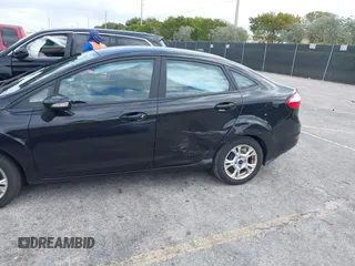 2015 Ford Fiesta SE with VIN 3FADP4BJ5FM130099, listed as a IAAI auction lot 42126960 with 82,299 mi miles and . Bid and sale history available at DreamBid. Image 6.