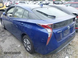 2017 Toyota Prius Two with VIN JTDKBRFU6H3560617, listed as a IAAI auction lot 41935727 with 63,892 mi miles and . Bid and sale history available at carsss.com. Image 3.
