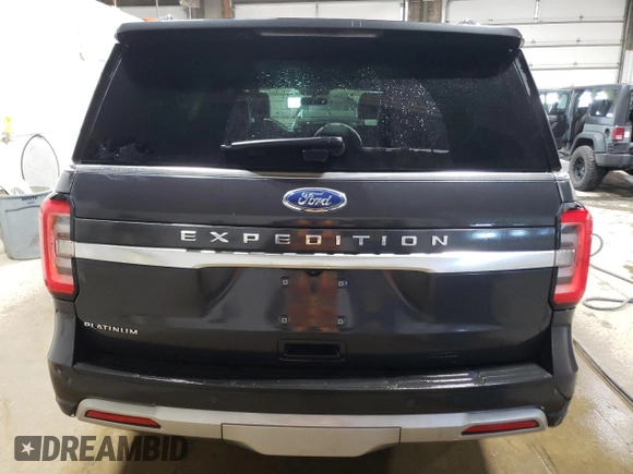 2022 Ford Expedition Platinum with VIN 1FMJU1MTXNEA47383, listed as a Copart auction lot 87005364 with 28,696 mi miles and Salvage title. Bid and sale history available at DreamBid. Image 6.