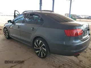 2013 Volkswagen Jetta S with VIN 3VW2K7AJ8DM400911, listed as a Copart auction lot 63826825 with 127,617 mi miles and Salvage title. Bid and sale history available at DreamBid. Image 2.