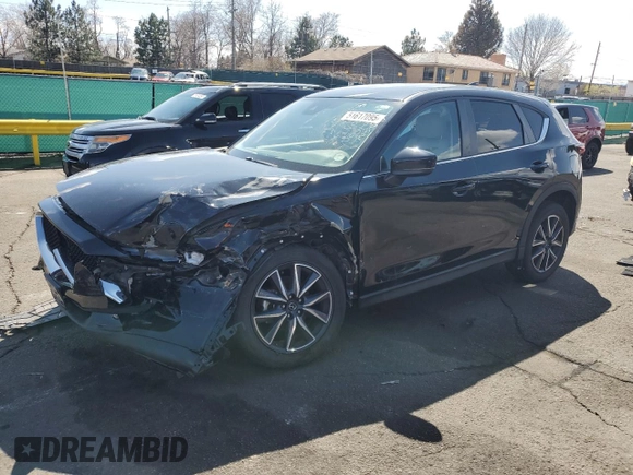 2018 Mazda CX-5 Touring with VIN JM3KFBCM4J0466234, listed as a Copart auction lot 51617095 with 58,200 mi miles and Salvage Title. Bid and sale history available at carsss.com. Image 1.