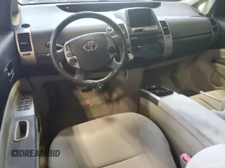 2007 Toyota Prius z VIN JTDKB20U577556730, wystawiony jako Copart lot #61117255 z przebiegiem Nie podano mil oraz Nie do naprawy • Non repairable. Historia ofert i sprzedaży dostępna na DreamBid. Obrazek 8.