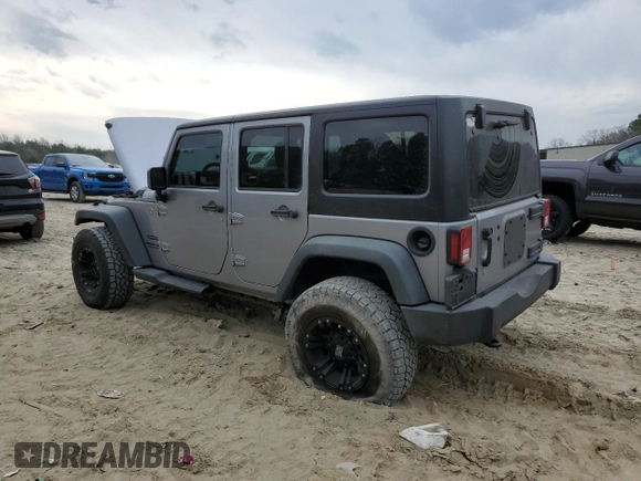 2015 Jeep Wrangler Unlimited Willys Wheeler with VIN 1C4BJWDG4FL723924, listed as a Copart auction lot 47145245 with 166,256 mi miles and Salvage Title. Bid and sale history available at DreamBid. Image 2.