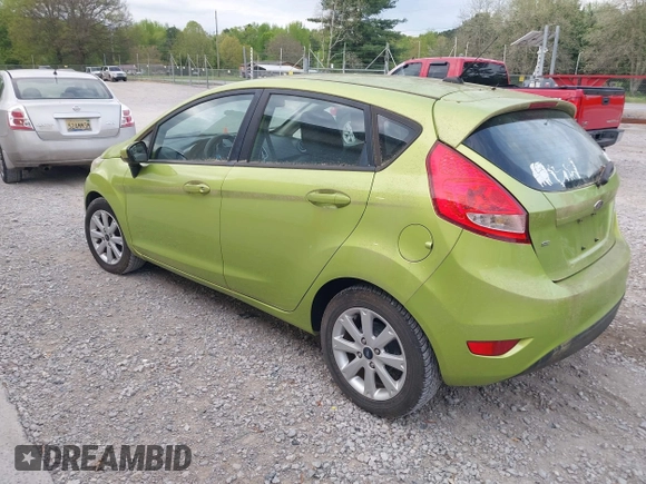 2011 Ford Fiesta SE with VIN 3FADP4EJXBM164397, listed as a IAAI auction lot 42046591 with 118,953 mi miles. Bid and sale history available at carsss.com. Image 3.
