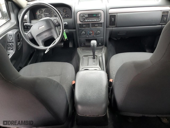 2004 Jeep Grand Cherokee Laredo with VIN 1J4GX48S64C151124, listed as a Copart auction lot 52669445 with 152,970 mi miles and Salvage Title. Bid and sale history available at carsss.com. Image 8.
