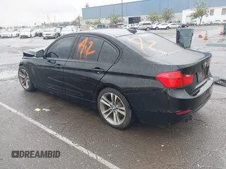 2015 BMW 3 Series 328i with VIN WBA3A5G51FNS83378, listed as a IAAI auction lot 41719392 with 114,146 mi miles. Bid and sale history available at carsss.com. Image 3.