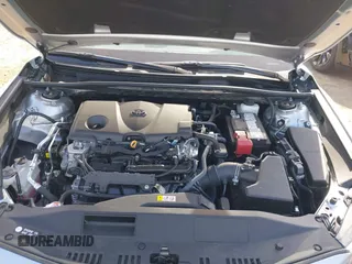 2023 Toyota Camry SE z VIN 4T1T11AK0PU153203, wystawiony jako IAAI lot #38763517 z przebiegiem 11 171 mil mil oraz . Historia ofert i sprzedaży dostępna na DreamBid. Obrazek 10.
