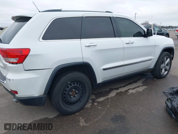 2013 Jeep Grand Cherokee Overland with VIN 1C4RJECG3DC620873, listed as a IAAI auction lot 40909601 with 195,374 mi miles. Bid and sale history available at carsss.com. Image 4.