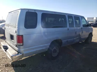 1999 Ford Econoline Passenger XL with VIN 1FBSS31L6XHB60672, listed as a Copart auction lot 79319714 with 295,551 mi miles and Clean Title. Bid and sale history available at DreamBid. Image 3.