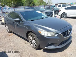 2014 Mazda Mazda6 i Touring with VIN JM1GJ1V6XE1154862, listed as a IAAI auction lot 42052904 with 301,752 mi miles. Bid and sale history available at carsss.com. Image 1.