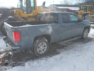 2014 Chevrolet Silverado 1500 LT with VIN 1GCVKREC0EZ291142, listed as a IAAI auction lot 41288155 with 112,384 mi miles and . Bid and sale history available at DreamBid. Image 4.