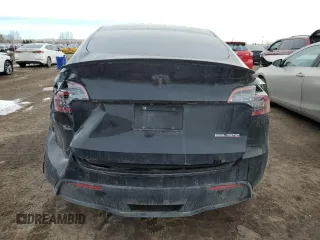 2022 Tesla Model Y Performance z VIN 7SAYGDEF5NF512464, wystawiony jako Copart lot #46337165 z przebiegiem 74 761 mil mil oraz Szkoda całkowita • Salvage title. Historia ofert i sprzedaży dostępna na DreamBid. Obrazek 6.