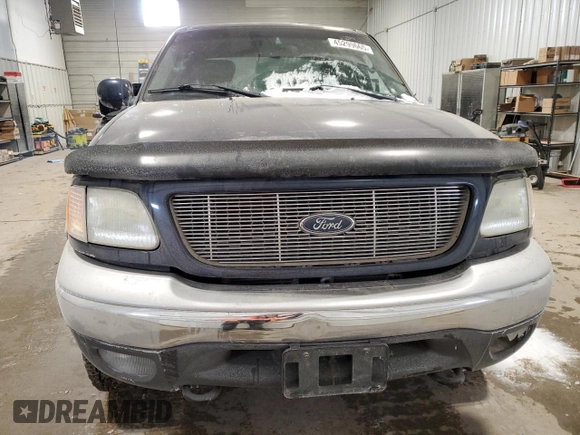2002 Ford F-150 XLT with VIN 1FTRW08L12KE11970, listed as a Copart auction lot 45299665 with 173,802 mi miles and Salvage Title. Bid and sale history available at carsss.com. Image 5.
