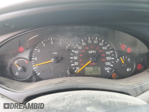 2004 Ford Focus ZX5 z VIN 3FAHP37324R110690, wystawiony jako Copart lot #49965085 z przebiegiem 178 749 mil mil oraz Czysty tytuł • Clean title. Historia ofert i sprzedaży dostępna na DreamBid. Obrazek 9.