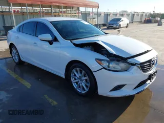 2015 Mazda 6 i Sport with VIN JM1GJ1U53F1196218, listed as a IAAI auction lot 41385343 with 133,508 mi miles. Bid and sale history available at carsss.com. Image 1.