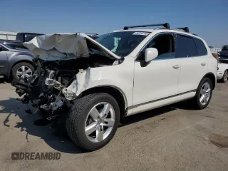2011 Volkswagen Touareg Sport with VIN WVGFF9BP1BD006940, listed as a Copart auction lot 54915745 with 162,341 mi miles and Salvage title. Bid and sale history available at DreamBid. Image 1.