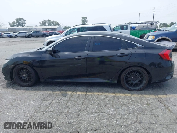 2021 Honda Civic Sport with VIN 2HGFC2F88MH557221, listed as a IAAI auction lot 42161778 with 101,956 mi miles and . Bid and sale history available at DreamBid. Image 14.