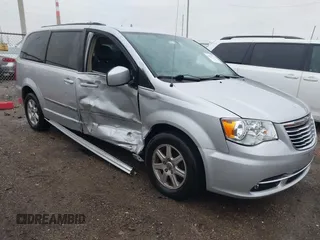 2012 Chrysler Town & Country Touring with VIN 2C4RC1BGXCR213014, listed as a IAAI auction lot 41997723 with 143,848 mi miles. Bid and sale history available at carsss.com. Image 1.