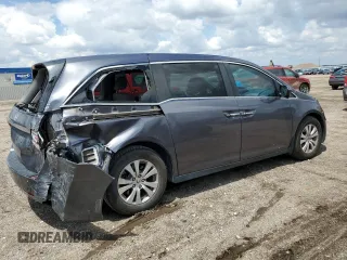 2016 Honda Odyssey EX-L z VIN 5FNRL5H65GB017067, wystawiony jako Copart lot #58424235 z przebiegiem 89 988 mil mil oraz Szkoda całkowita • Salvage title. Historia ofert i sprzedaży dostępna na DreamBid. Obrazek 3.