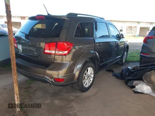 2018 Dodge Journey SXT with VIN 3C4PDCBB6JT311083, listed as a IAAI auction lot 41920927 with Not provided miles and . Bid and sale history available at DreamBid. Image 4.