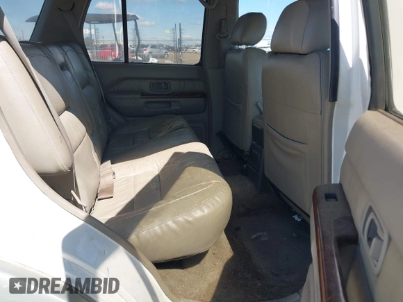 1998 Infiniti QX4 with VIN JNRAR05Y2WW029479, listed as a IAAI auction lot 41939734 with 216,043 mi miles and . Bid and sale history available at DreamBid. Image 8.