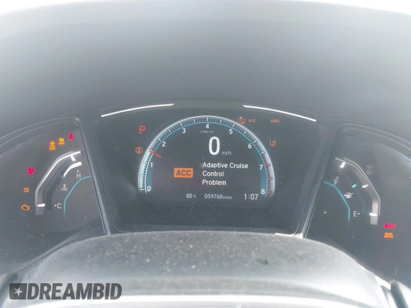 2020 Honda Civic LX with VIN 2HGFC2F65LH505932, listed as a IAAI auction lot 40046863 with 59,768 mi miles and . Bid and sale history available at DreamBid. Image 7.