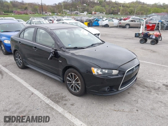 2015 Mitsubishi Lancer SE with VIN JA32V2FW2FU002303, listed as a IAAI auction lot 41927592 with 32,444 mi miles. Bid and sale history available at carsss.com. Image 1.