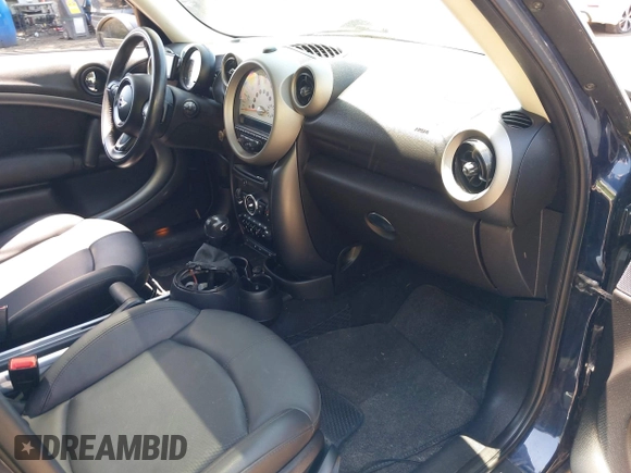 2012 MINI Countryman S with VIN WMWZC5C51CWL59956, listed as a IAAI auction lot 42417954 with 79,732 mi miles and . Bid and sale history available at DreamBid. Image 5.