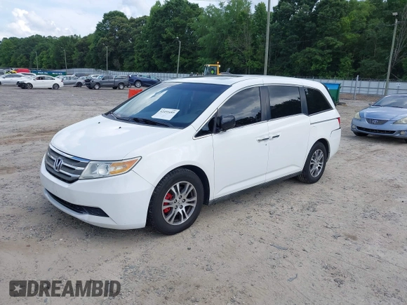 2011 Honda Odyssey EX-L with VIN 5FNRL5H67BB011070, listed as a IAAI auction lot 42491685 with 200,671 mi miles and . Bid and sale history available at DreamBid. Image 2.