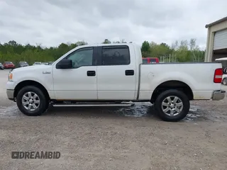2007 Ford F-150 XLT z VIN 1FTRW14W27KD53977, wystawiony jako IAAI lot #41935006 z przebiegiem 163 444 mil mil oraz . Historia ofert i sprzedaży dostępna na DreamBid. Obrazek 14.