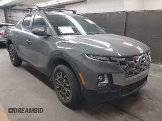 2022 Hyundai Santa Cruz SEL z VIN 5NTJCDAE5NH036310, wystawiony jako IAAI lot #42173192 z przebiegiem 16 198 mil mil oraz . Historia ofert i sprzedaży dostępna na DreamBid. Obrazek 1.