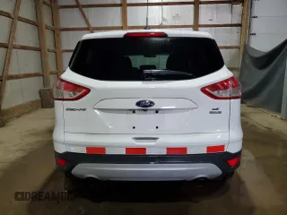 2014 Ford Escape SE with VIN 1FMCU9G98EUC19083, listed as a Copart auction lot 63421915 with 108,042 mi miles and Clean title. Bid and sale history available at DreamBid. Image 6.
