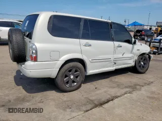 2003 Suzuki XL7 Touring with VIN JS3TY92V334105374, listed as a Copart auction lot 64013375 with 177,939 mi miles and Salvage title. Bid and sale history available at DreamBid. Image 3.