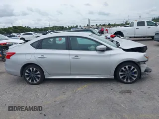 2018 Nissan Sentra S with VIN 3N1AB7AP7JY334393, listed as a IAAI auction lot 41751028 with 91,615 mi miles and . Bid and sale history available at DreamBid. Image 12.